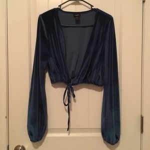 Here I have a navy blue velvet crop top